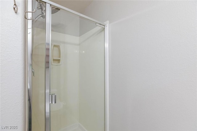 bathroom with walk in shower