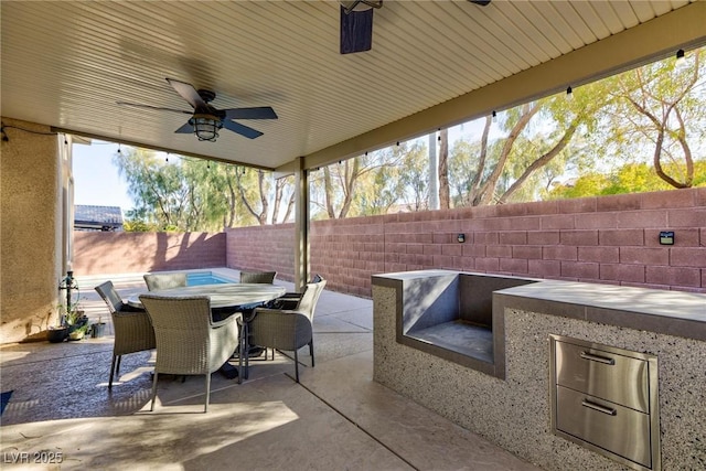 view of patio / terrace with ceiling fan