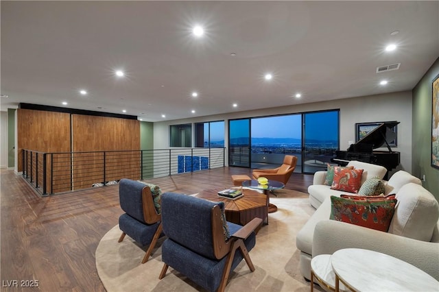 living room with light hardwood / wood-style flooring