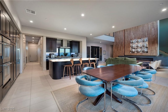 dining room with light tile patterned floors