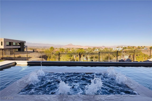 view of pool with a mountain view