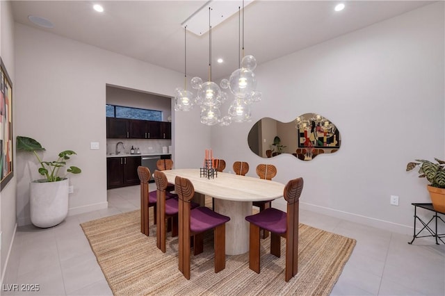 tiled dining room with sink