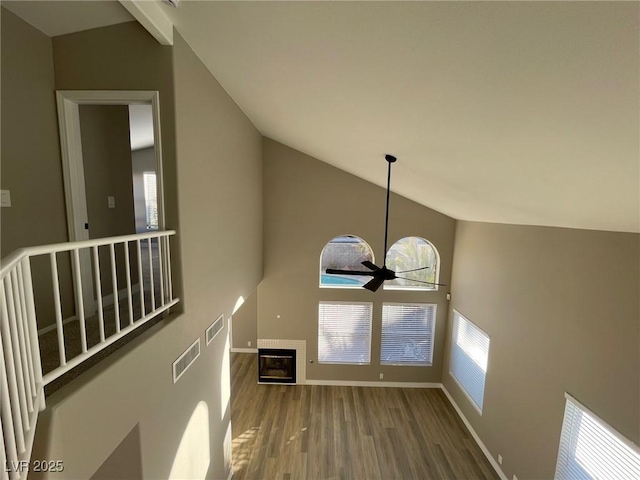 interior space featuring hardwood / wood-style floors, a fireplace, and ceiling fan