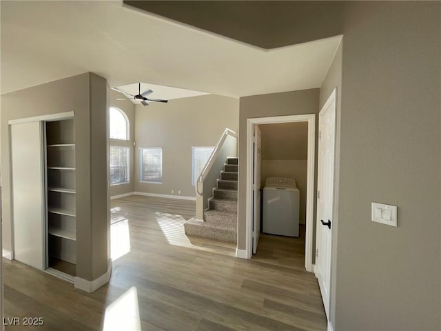 interior space featuring washer / dryer and wood-type flooring