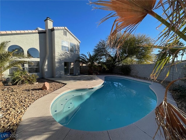 view of pool with a patio