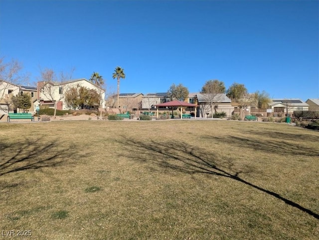 view of yard with a gazebo and a residential view