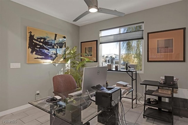 office with baseboards and a ceiling fan