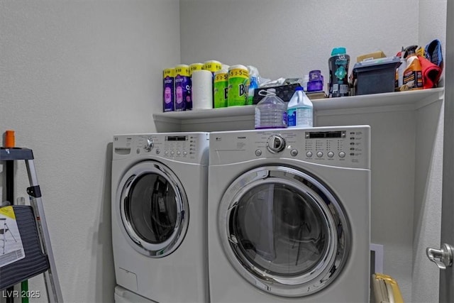 laundry area featuring laundry area and separate washer and dryer