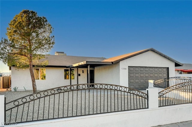 single story home featuring a garage