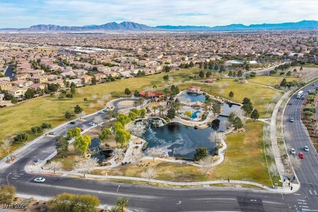 aerial view with a water and mountain view