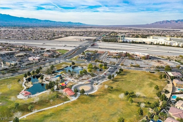 aerial view with a water and mountain view