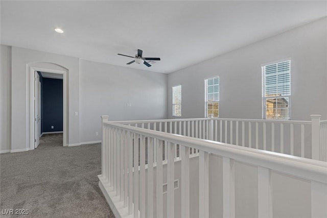 hallway featuring carpet flooring