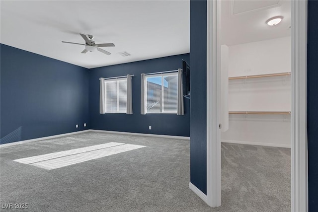 interior space featuring ceiling fan, a closet, and carpet floors