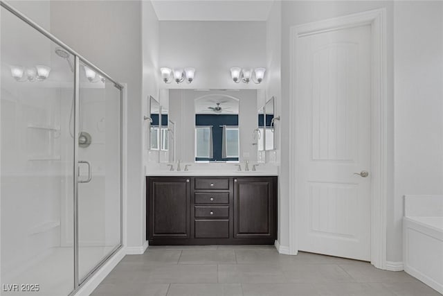 bathroom with ceiling fan, shower with separate bathtub, tile patterned floors, and vanity