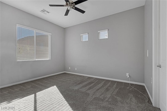 carpeted empty room with ceiling fan