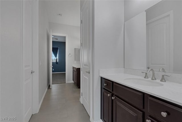 bathroom with vanity and tile patterned floors