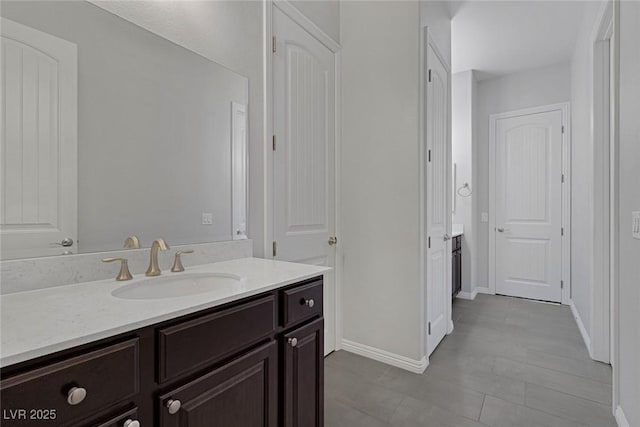 bathroom featuring vanity and tile patterned flooring