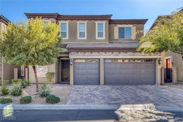 view of front of property featuring a garage