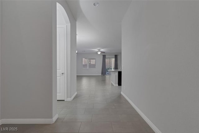 corridor with light tile patterned floors