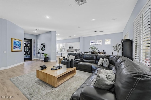 living room featuring light hardwood / wood-style flooring