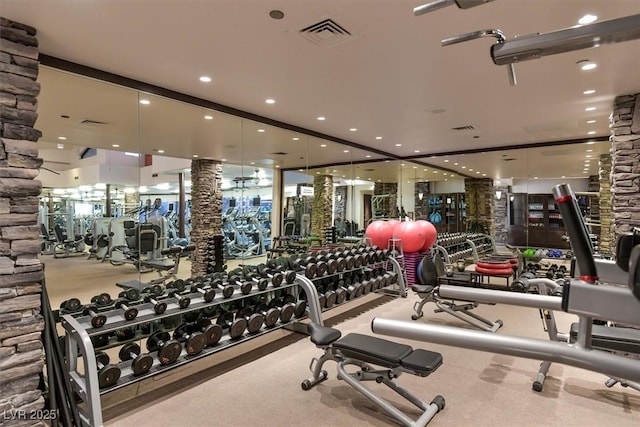 workout area with decorative columns