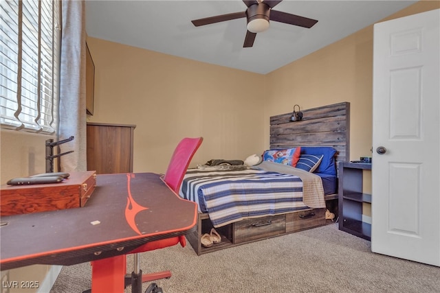 carpeted bedroom with ceiling fan