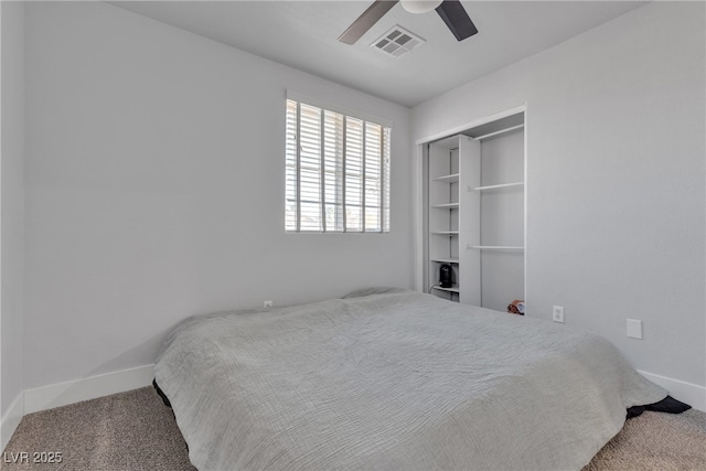 bedroom featuring a closet, ceiling fan, and carpet