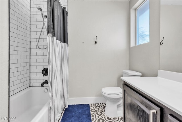 full bathroom featuring tile patterned floors, shower / tub combo with curtain, vanity, and toilet