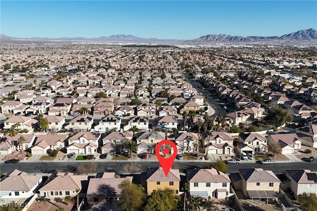 drone / aerial view featuring a mountain view