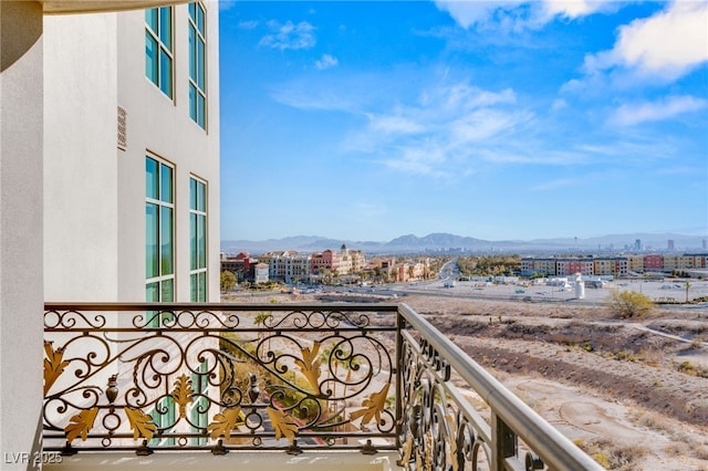 balcony featuring a mountain view