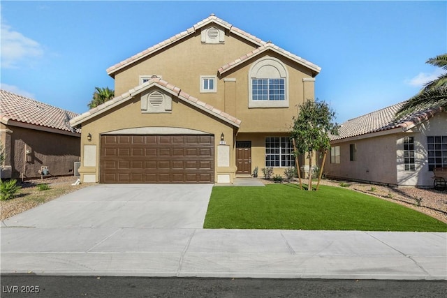 view of front of property with a front lawn and a garage