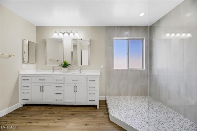 bathroom featuring wood-type flooring and vanity