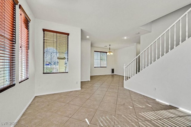 interior space with a notable chandelier