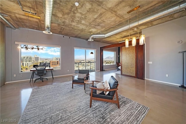 living area featuring concrete flooring