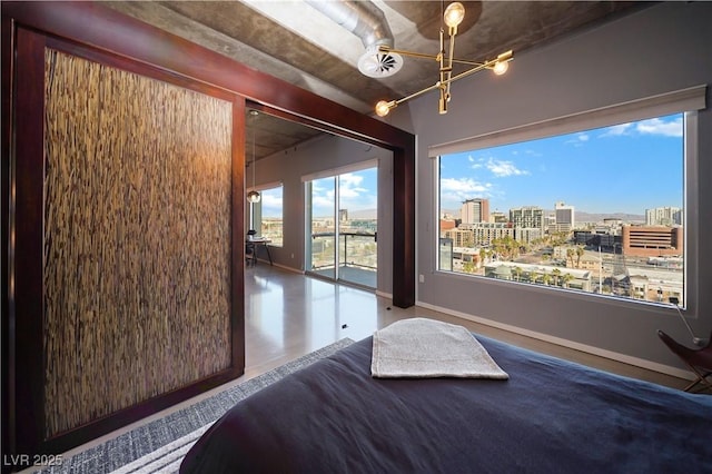 bedroom featuring a notable chandelier