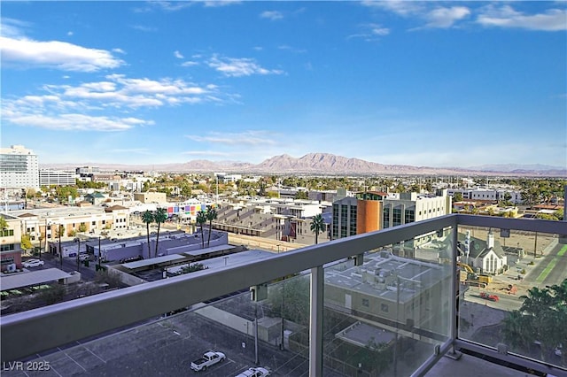 balcony featuring a mountain view