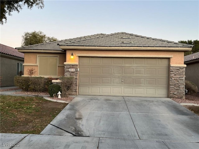 view of front of property with a garage