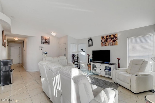 living room with light tile patterned flooring