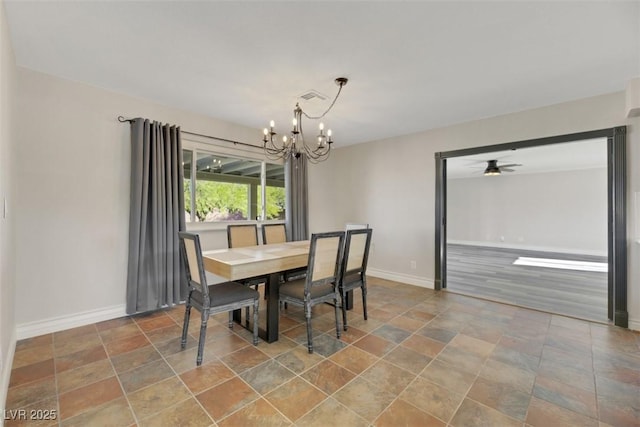 dining area with ceiling fan with notable chandelier