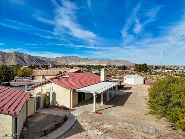 exterior space featuring a mountain view