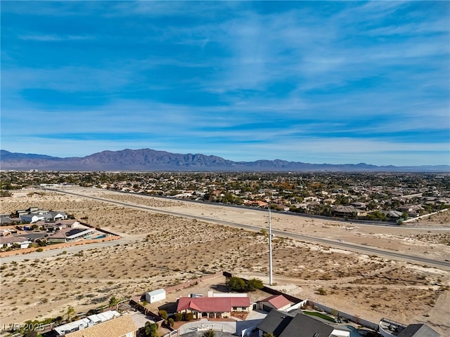 birds eye view of property featuring a mountain view