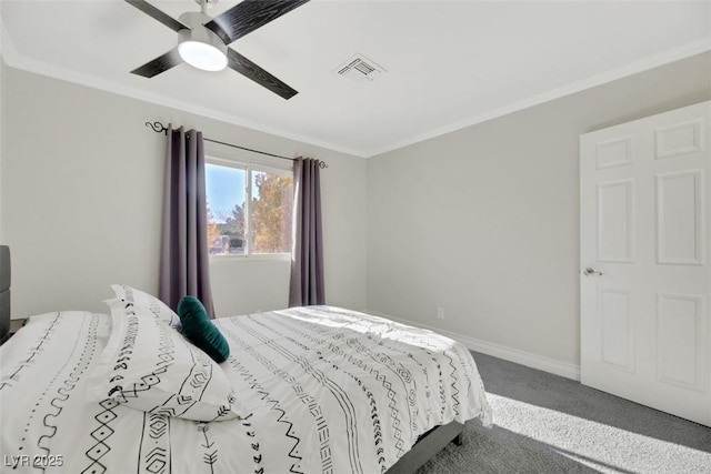 bedroom featuring ceiling fan, carpet, and crown molding