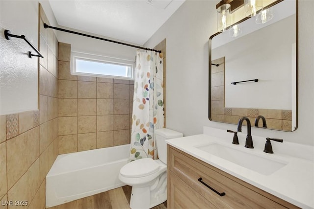 full bathroom with toilet, shower / bathtub combination with curtain, wood-type flooring, and vanity