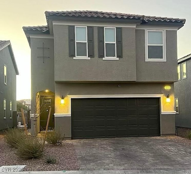 view of front of house with a garage