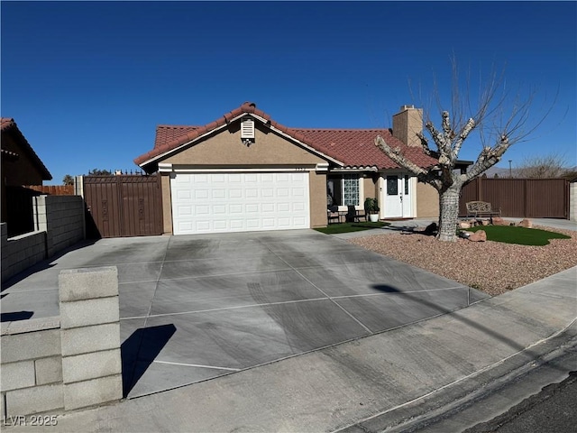 ranch-style house featuring a garage