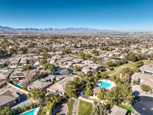 drone / aerial view featuring a mountain view