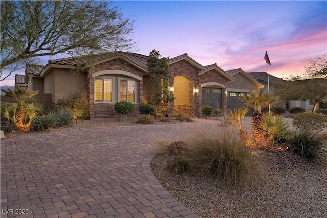 view of front of property featuring a garage