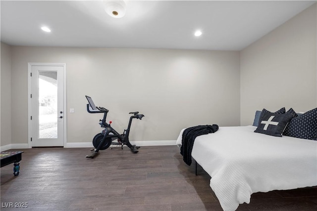 bedroom featuring access to exterior and hardwood / wood-style floors