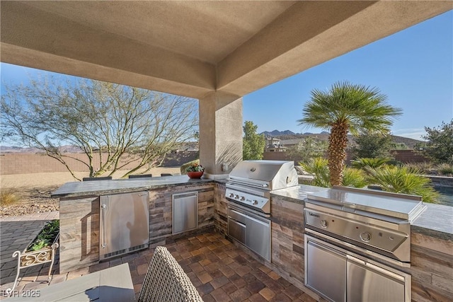 view of patio featuring a grill and area for grilling