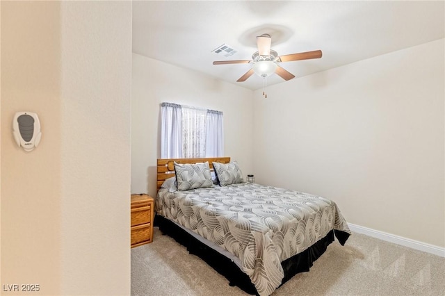 bedroom with light carpet and ceiling fan